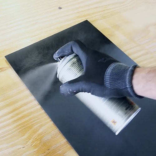 Applying Montana Plastic Primer to prepared surface